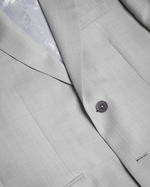 BYRONJ-Suits-A refined take on the classic suit, our BYRONJ blazer features single-breasted buttons and a peaked lapel. This style is perfect for layering over a crisp shirt and adding some panache to your weekday wardrobe. Blazer Virgin wool Peaked lapel Single breasted buttons Long sleeved Pockets Ty is 6'1" / 1.86m and wears Medium Pink in a Ted size 3- Ted Baker Romania